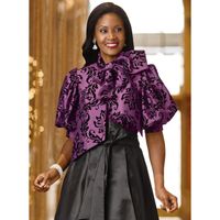 Shimmering taffeta with a beautiful flocked filigree design enhances the feminine, romantic silhouette of this dramatic top. Features a button front, an attached self tie at the neck, and elbow length puff sleeves. Pairs perfectly with palazzos or skirts for a dramatic and festive look youll love. 24 from center back neck. 100 polyester. Dry clean. Imported.